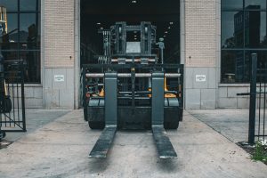Royal Rig-N-Lift high-capacity forklift illustrating the difference between rated capacity and actual lifting capacity based on load center.